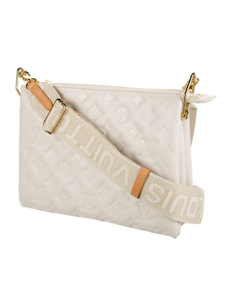 white coussin louis vuitton